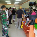 Menyongsong New Normal Babinsa Bersama Unsur Terkait Melaksanakan Pendisiplinan Masyarakat