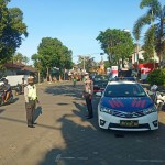 Sinergitas Polantas, Bahbinkamtibmas dan Pecalang Atur Arus Lalu Lintas