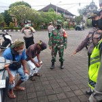 Tim Penindak Yustisi Agung Covid -19 Tindak Pelanggar Prokes di Pasar Mengwi