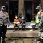 Sinergitas Bhabinkamtibmas dan Babinsa Desa Undisan, Treatment Terhadap Warga Terdampak Covid 19.
