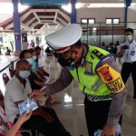 Gebyar Vaksinasi, Gebyar Sembako Dan Masker Oleh Satlantas Polres Badung Diterminal Tipe A Mengwi