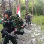Even though the terrain is difficult, the Battalion 123/RW Task Force Patrol Checks the RI-Papua New Guinea State Boundary Marks