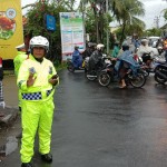 Kolaborasi Lalu Lintas Dengan Pecalang Amankan Melasti