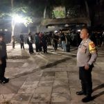 Sinergi Polda Bali, Polresta Denpasar, dan Pecalang Amankan XD Fiesta 2024 di Pantai Padang Galak