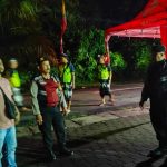 Berikan Atensi Di Kantong Parkir, Patroli Samapta Polsek Abiansemal Sambangi Turnamen Bola Voli Poryuda Cup