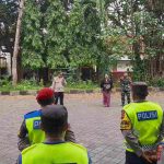 Pastikan Keamanan Pengerupukan, Kapolsek Dentim Pimpin Apel Kesiapan di Lapangan Renon