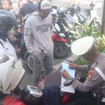 Operasi Patuh Agung 2025 Polresta Denpasar Tindak 49 Pelanggar di Simpang Buagan