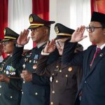 Kapolres Klungkung Hadiri Upacara Penuruan Bendera Merah Putih HUT RI ke-80