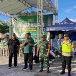 Bhabinkamtibmas Kampung Kusamba Amankan Jalan Sehat Peringatan Isra Mi’raj