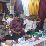 Bhabinkamtibmas Desa Akah Hadiri dan Amankan Pengundian Kupon Berhadiah