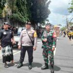 Kolaborasi Bhabinkamtibmas, Babinsa dan Pecalang Amankan Prosesi Ngaben di Banjar Bun