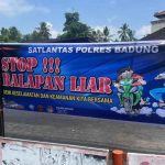 Stop Balap Liar, Polsek Mengwi Pasang Spanduk di Dua Lokasi Strategis