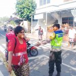 Polsek Kuta Utara Melalui Bhabinkamtibmas Amankan Ibadah Minggu Palma.