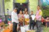 Sinergi dengan Perangkat Desa, Bhabinkamtibmas Kawal Penyerahan Bantuan Beras CPP
