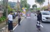 Bhabinkamtibmas Polsek Abiansemal Bersinergi Dengan Pecalang Amankan Jalannya Upacara Ngaben