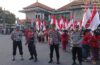 Kapolsek Mengwi Pimpin Langsung Pengamanan Kirab Bendera dan Kirab Obor di Desa Mengwi