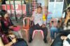 Sambangi Mahasiswa KKN di Bale Banjar Kerta Bumi, Bhabinkamtibmas Sumerta Kaja Berikan Imbauan Kamtibmas