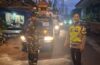 Bhabinkamtibmas Sulang Bersama Babinsa dan Pecalang Amankan Prosesi Melasti Menuju Goa Lawah